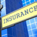 Sign pointing to insurance.